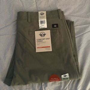 Dockers khakis in the color green and still has tags